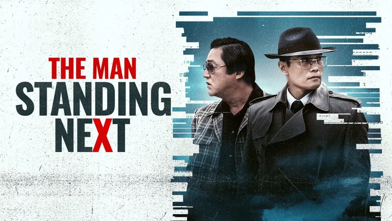 The Man Standing Next still