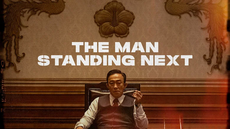The Man Standing Next still